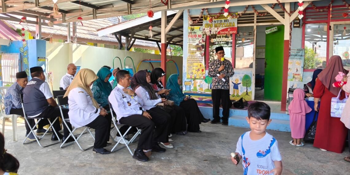 Kolaborasi Lintas Sektor, KUA Gunungguruh Sosialisasikan Gerakan Nasional Indonesia Berkiblat 1448K pada Gebyar Posyandu