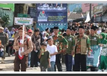 KUA Purabaya Dampingi dan Kobarkan Semangat Kafilah pada Pawai Taaruf PORSADIN VIII Kabupaten Sukabumi