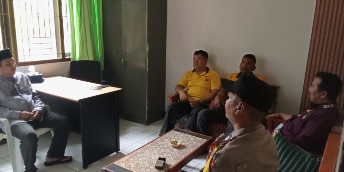 KUA Cikidang Perkuat Sinergitas dengan Polsek Bahas Kerukunan Umat Beragama dan Santunan Anak Yatim