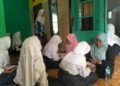 Perkuat Kemampuan Baca Tulis Al-Qur’an, Penyuluh KUA Cisolok Berikan Pembinaan BTQ di SMPN 1 Cisolok