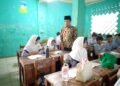 Perkuat Kemampuan Baca Tulis Al-Qur’an, Penyuluh KUA Parungkuda Bina Siswa SMPN 1 Parungkuda