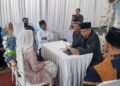 Hadir Layani Masyarakat, Penghulu KUA Cikidang Pimpin Akad Nikah di Mekarnangka